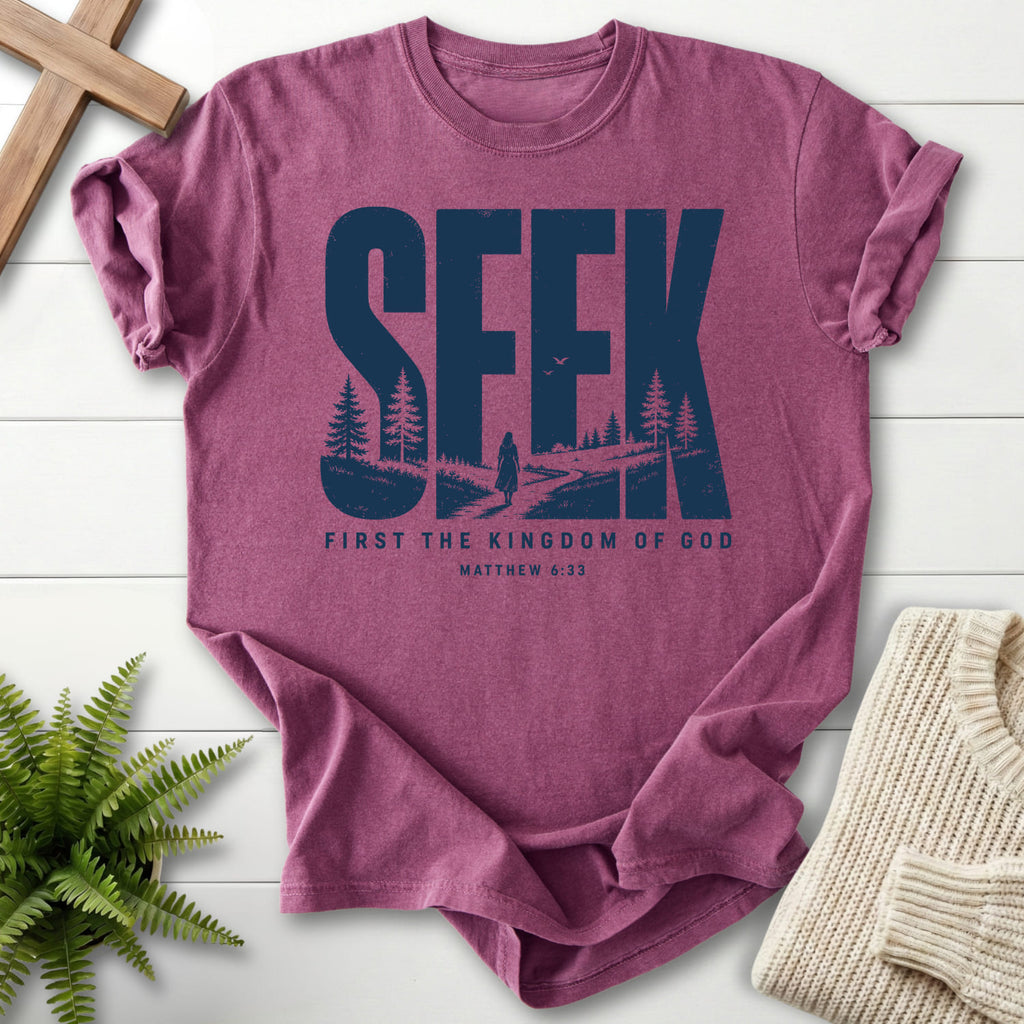 Flat lay of a Berry Christian graphic tee featuring "Seek First the Kingdom of God T-Shirt" Matthew 6:33.