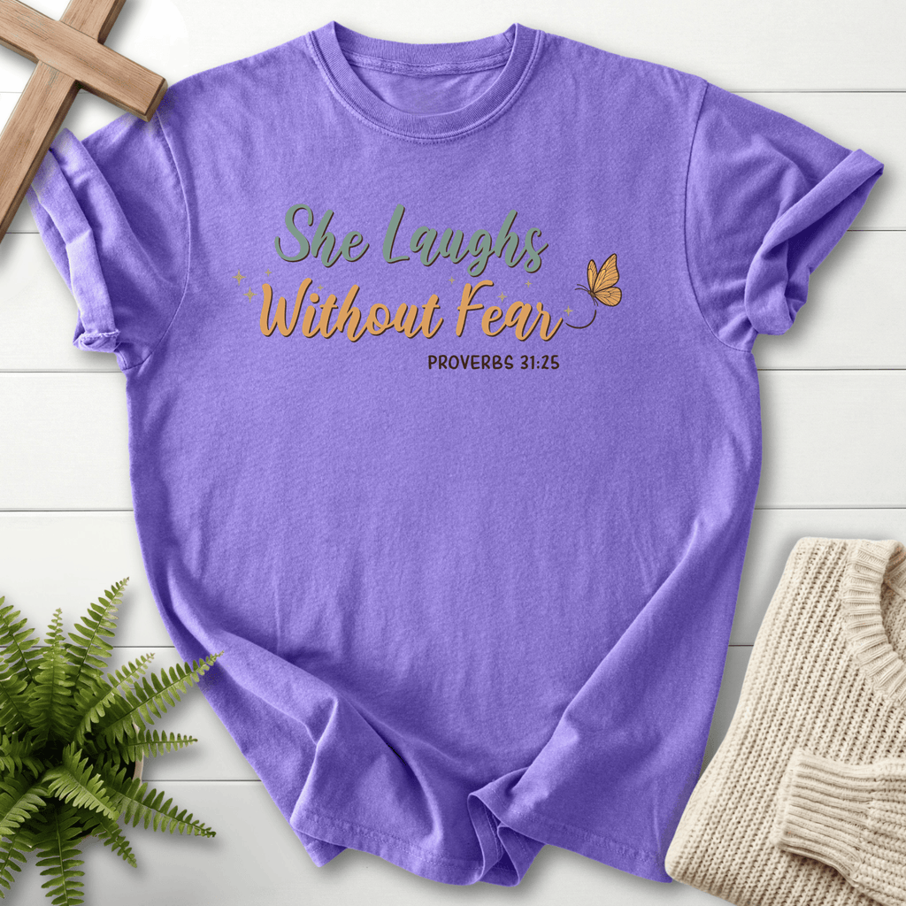 Violet women's Christian t-shirt with "She Laughs Without Fear" script, inspired by Proverbs 31:25.