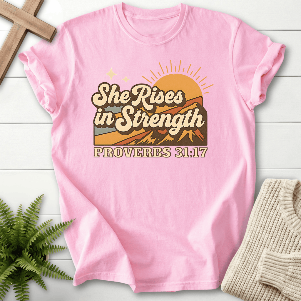 Blossom women's Scripture shirt with retro sunrise mountain scene, inspired by Proverbs 31:17.