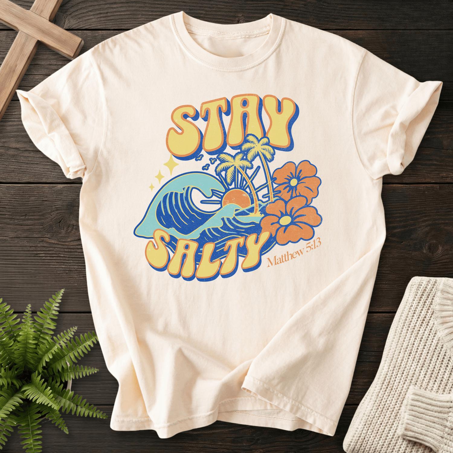 Ivory women's Christian t-shirt with retro beach Stay Salty design, inspired by Matthew 5:13.