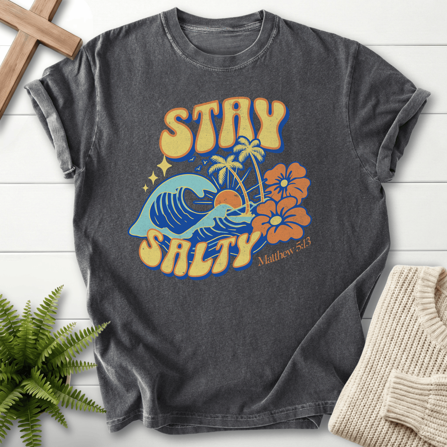 Pepper women's faith t-shirt with Stay Salty beach graphic and palm trees, inspired by Matthew 5:13.