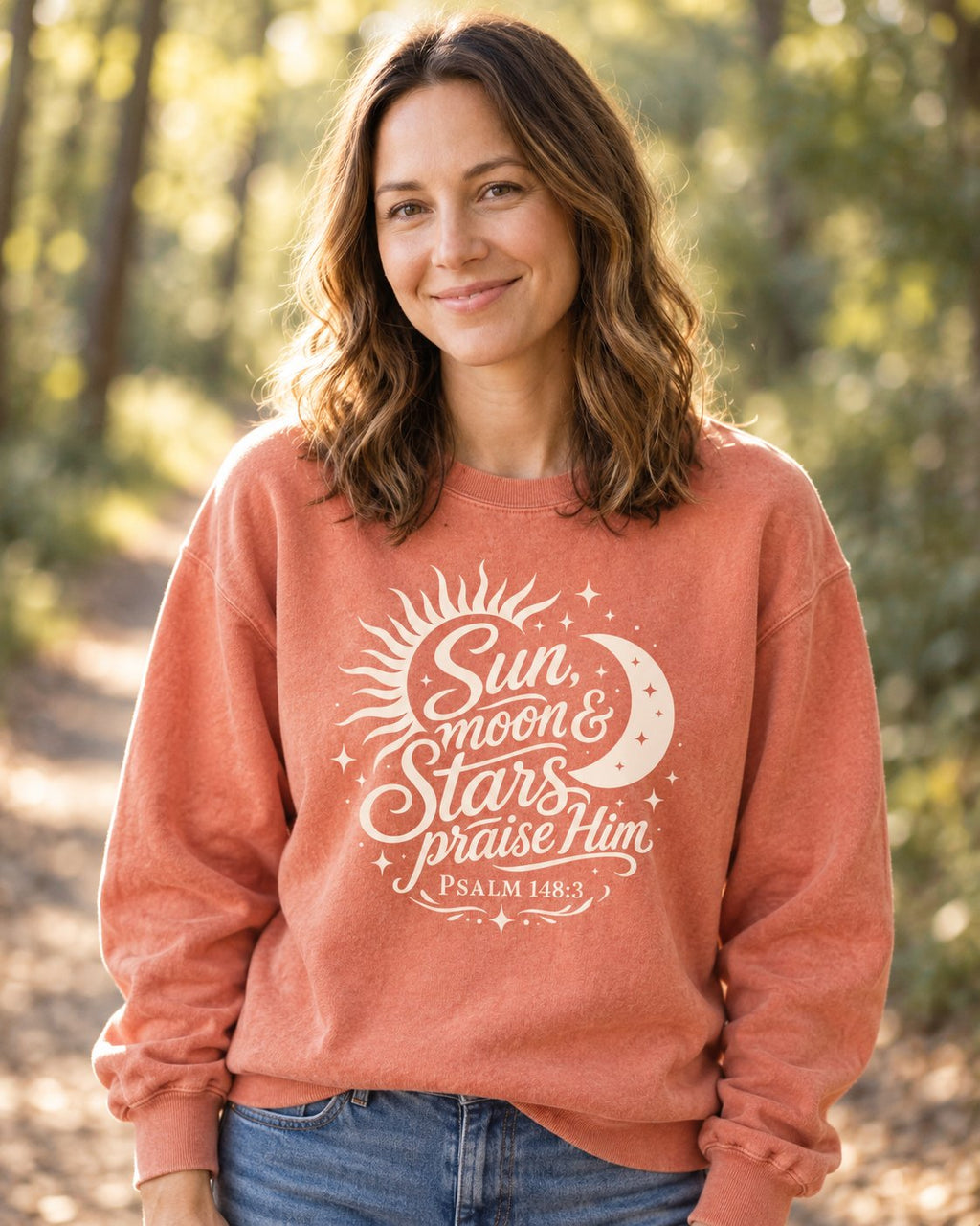 Sun Moon and Stars Praise Him – Terracotta women's Christian sweatshirt, lifestyle photo in nature trail – White sun moon and stars praise Him script – She Wears Faith
