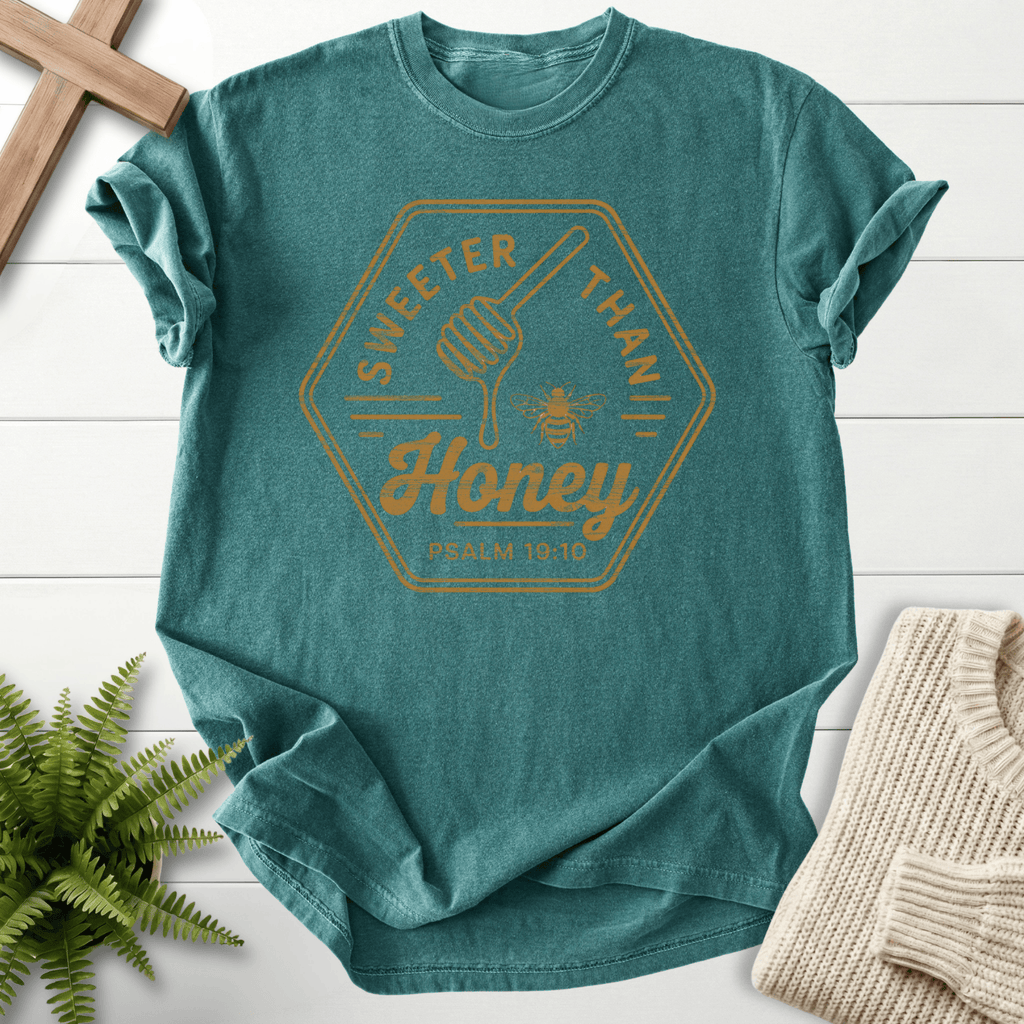 Blue Spruce Christian t-shirt for women with a honeybee badge design, by She Wears Faith, inspired by Psalm 19:10.