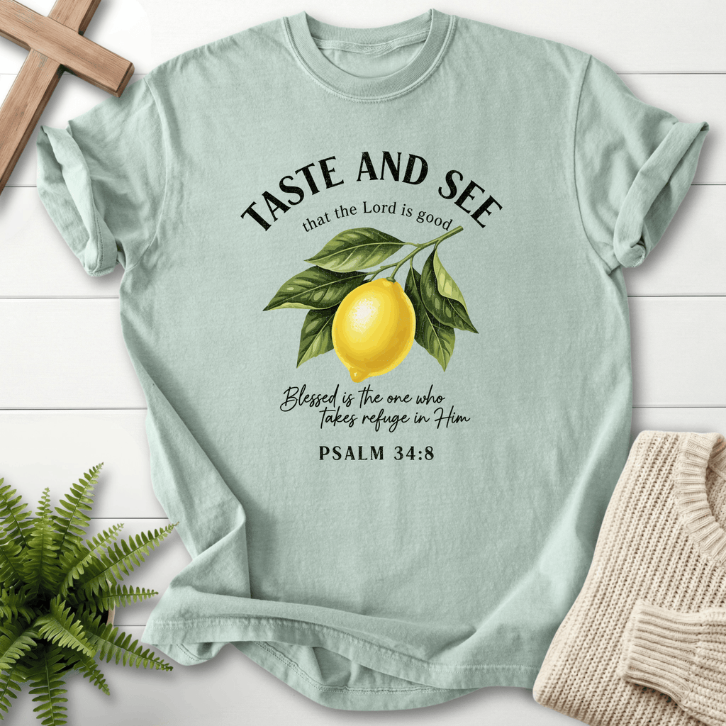 Bay faith-based tee with the Taste and See lemon design, arched text, and Psalm 34:8.