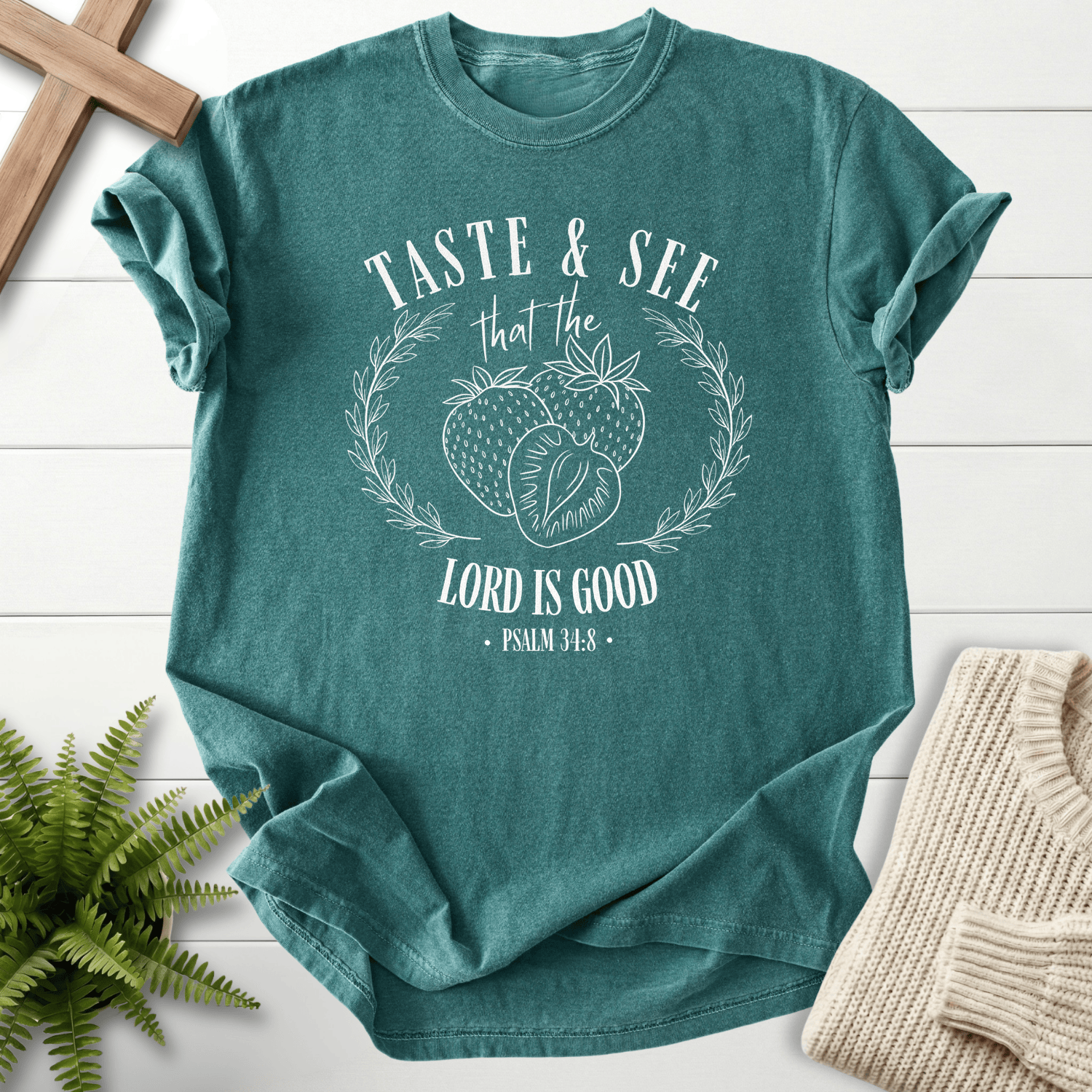 Blue Spruce Christian t-shirt for women with white strawberry line art and Taste and See text, inspired by Psalm 34:8.