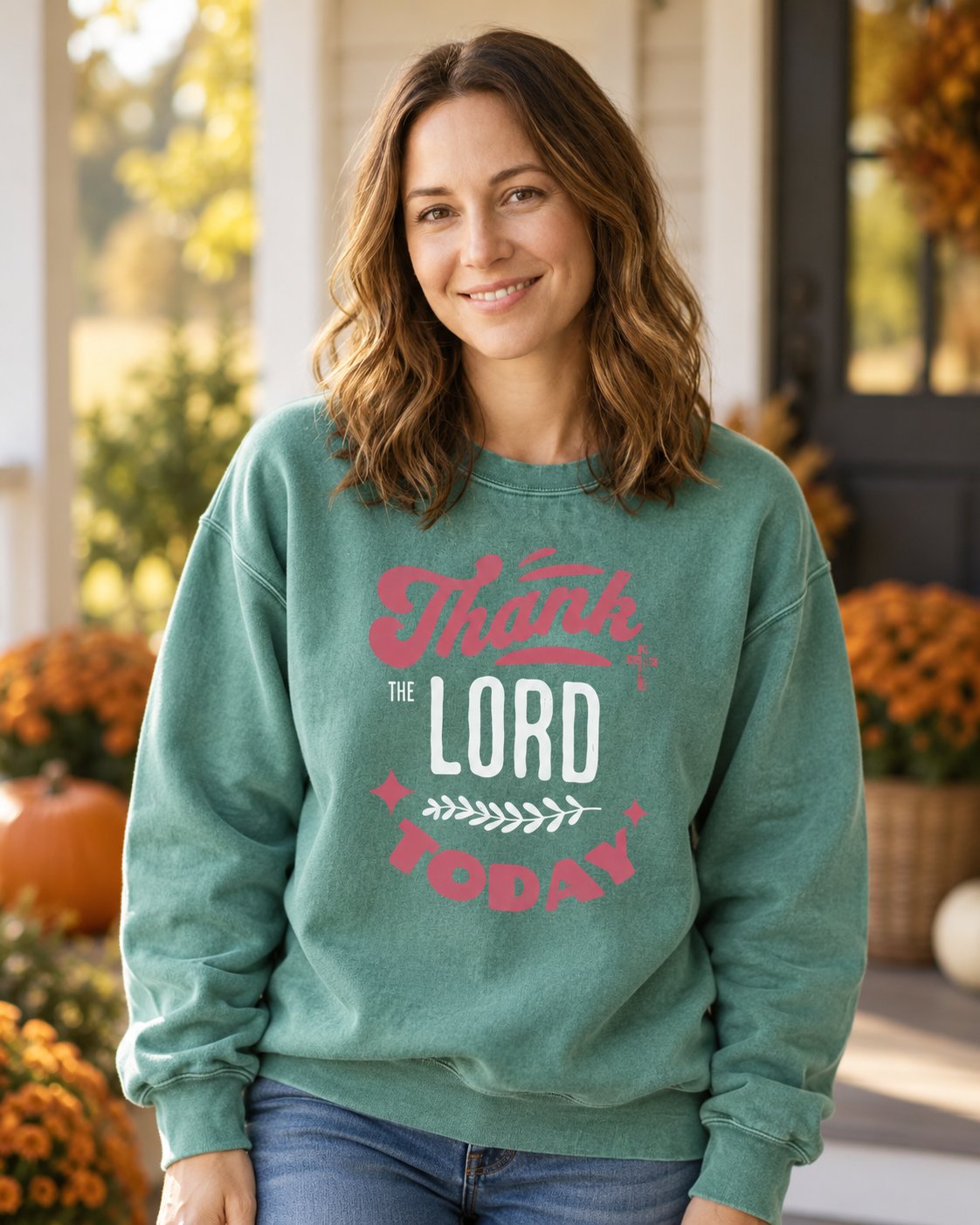 Thank the Lord Today – Light Green women's Christian sweatshirt, lifestyle photo in cozy autumn harvest setting – Red and cream Thank the LORD today lettering – She Wears Faith