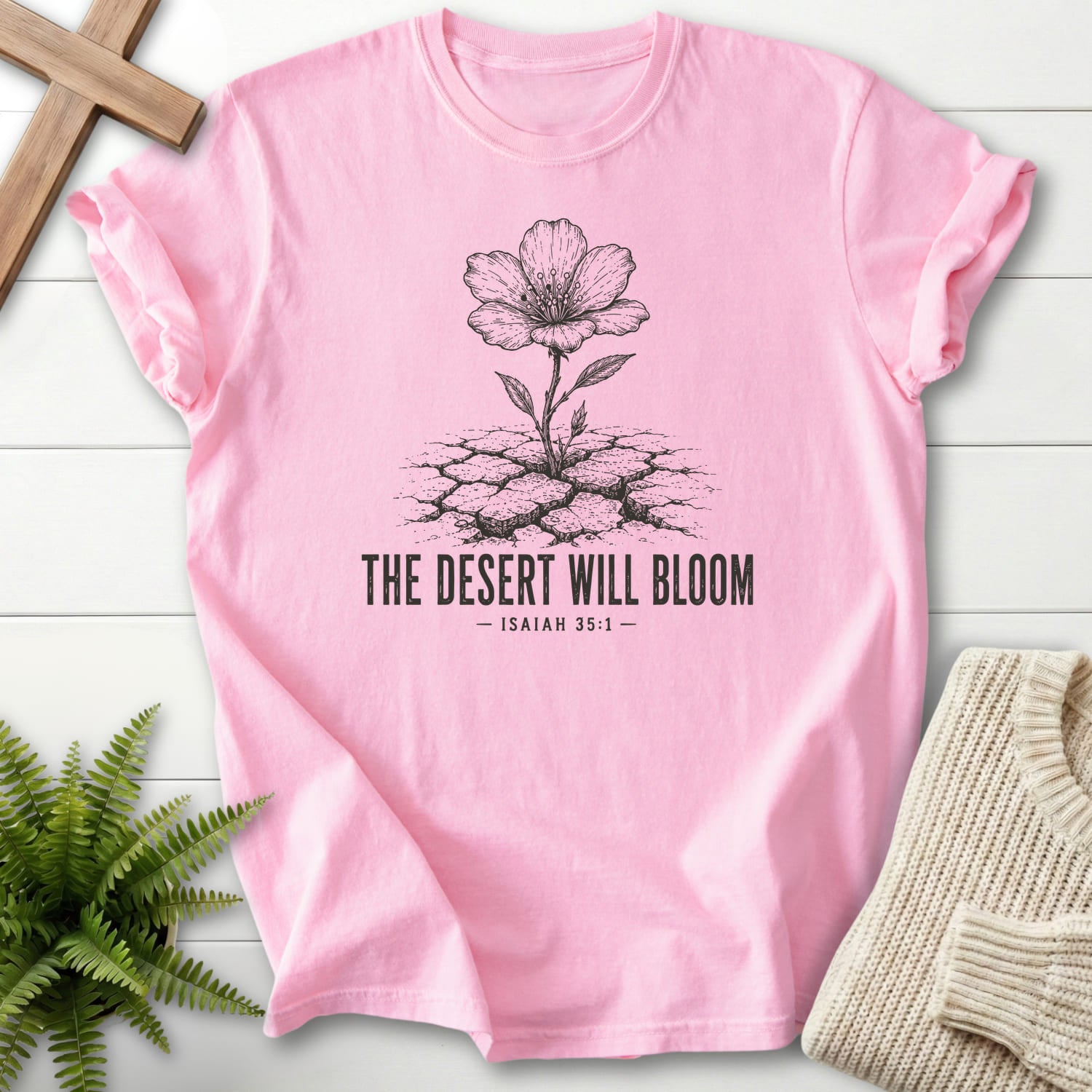Flatlay of a Blossom Comfort Colors 1717 Christian shirt with flower artwork with "The Desert Will Bloom T-Shirt".