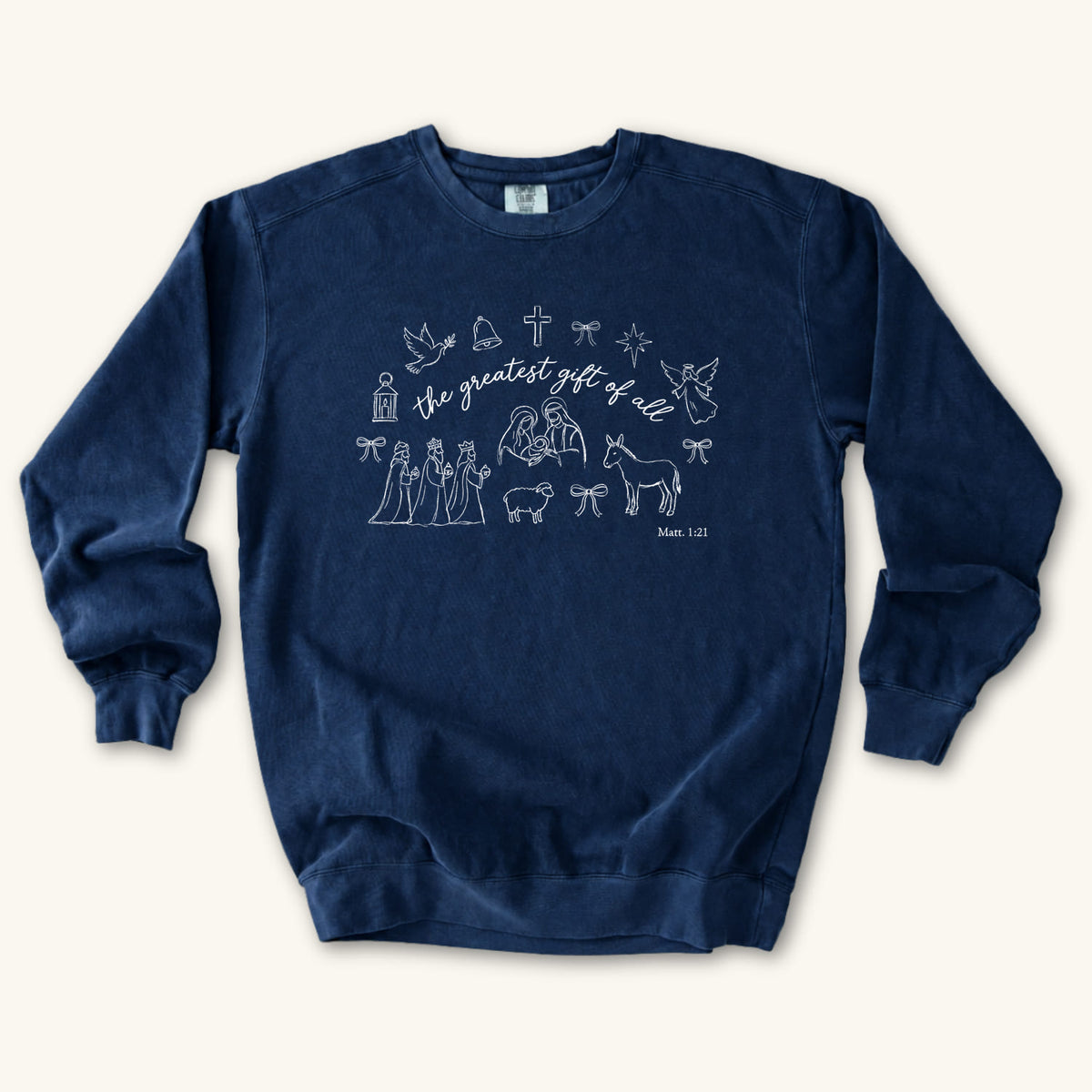True Navy Christian Christmas sweatshirt with the greatest gift of all script and line art of the holy family, wise men, a donkey, a lamb, an angel, a dove, a cross and Matthew 1:21.