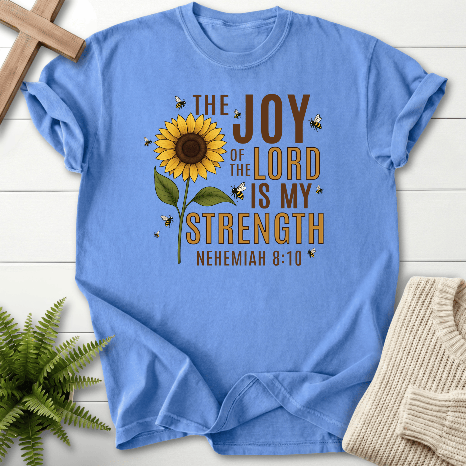 Mystic Blue faith-based tee with sunflower art and bold Joy of the Lord Is My Strength lettering, inspired by Nehemiah 8:10.