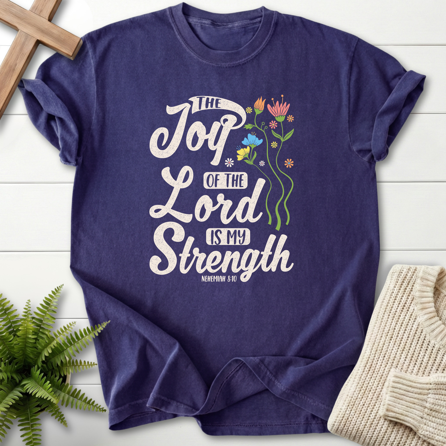 Grape Christian t-shirt for women with cursive Joy of the Lord Is My Strength lettering and colorful wildflower accents, inspired by Nehemiah 8:10.