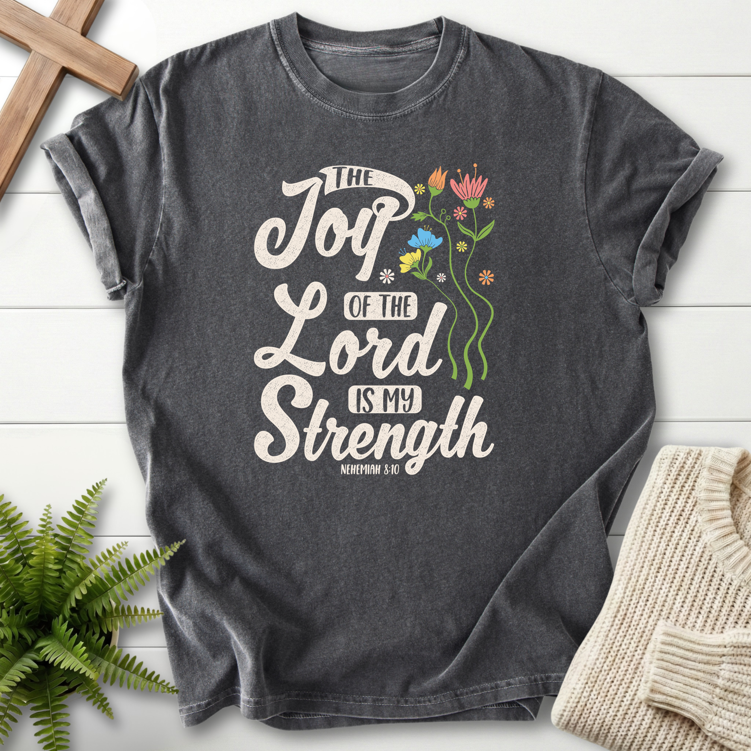 Pepper Christian t-shirt for women with colorful wildflower stems and The Joy of the Lord Is My Strength, inspired by Nehemiah 8:10.