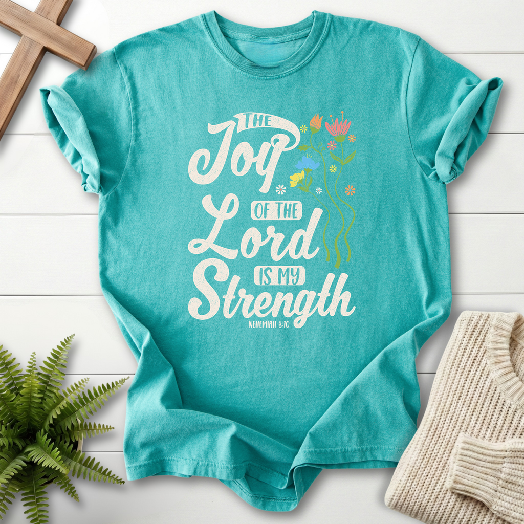 Seafoam faith-based tee with flowing Joy of the Lord Is My Strength script and floral accents, Comfort Colors 1717, inspired by Nehemiah 8:10.