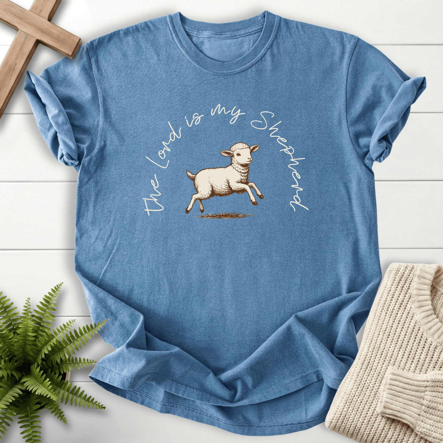 Blue Jean Scripture shirt with a vintage-style leaping lamb sketch and The Lord Is My Shepherd script, inspired by Psalm 23.