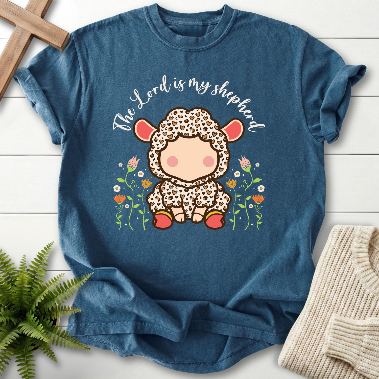 Midnight Christian t-shirt for women with a cute kawaii lamb and The Lord Is My Shepherd in flowing script, inspired by Psalm 23.