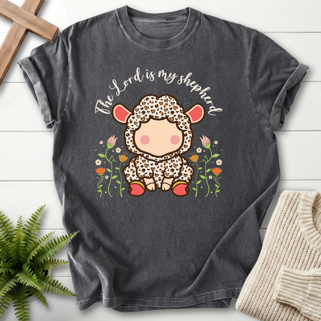 Pepper faith-based tee with a whimsical lamb onesie illustration and The Lord Is My Shepherd cursive, inspired by Psalm 23.
