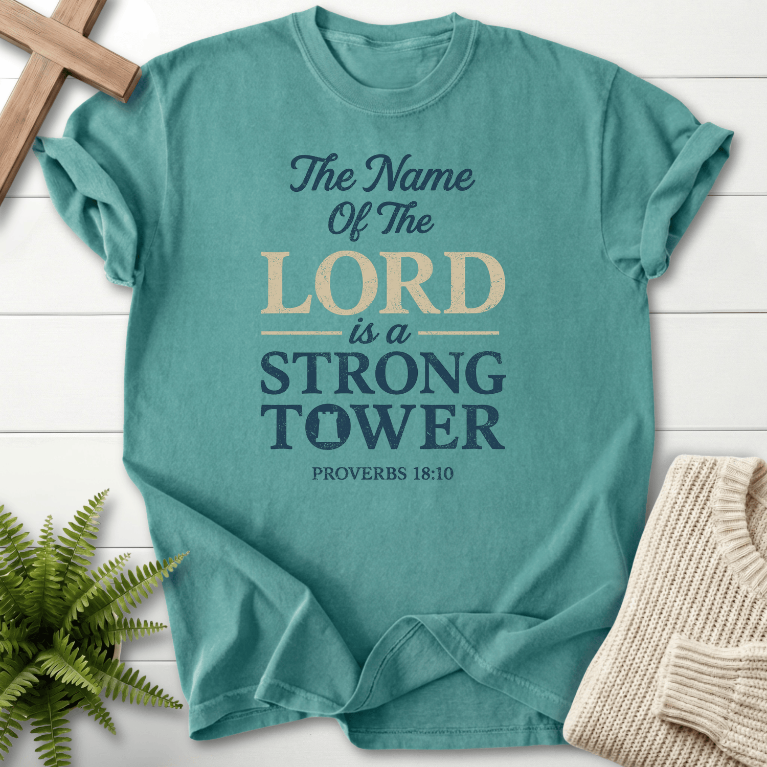 Chalky Mint Christian t-shirt for women with distressed Strong Tower typography, Comfort Colors 1717, inspired by Proverbs 18:10.