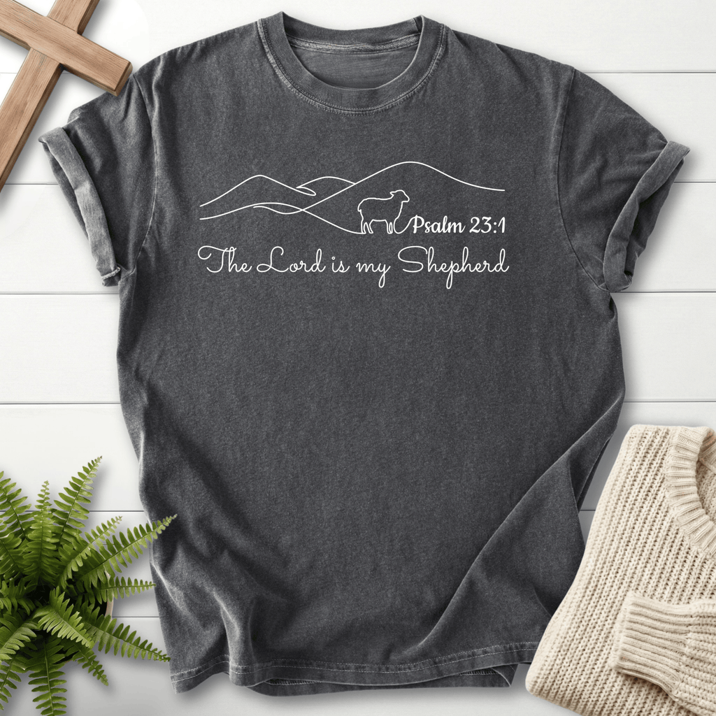 Pepper faith-based tee with a minimalist line-art shepherd scene, inspired by Psalm 23:1.