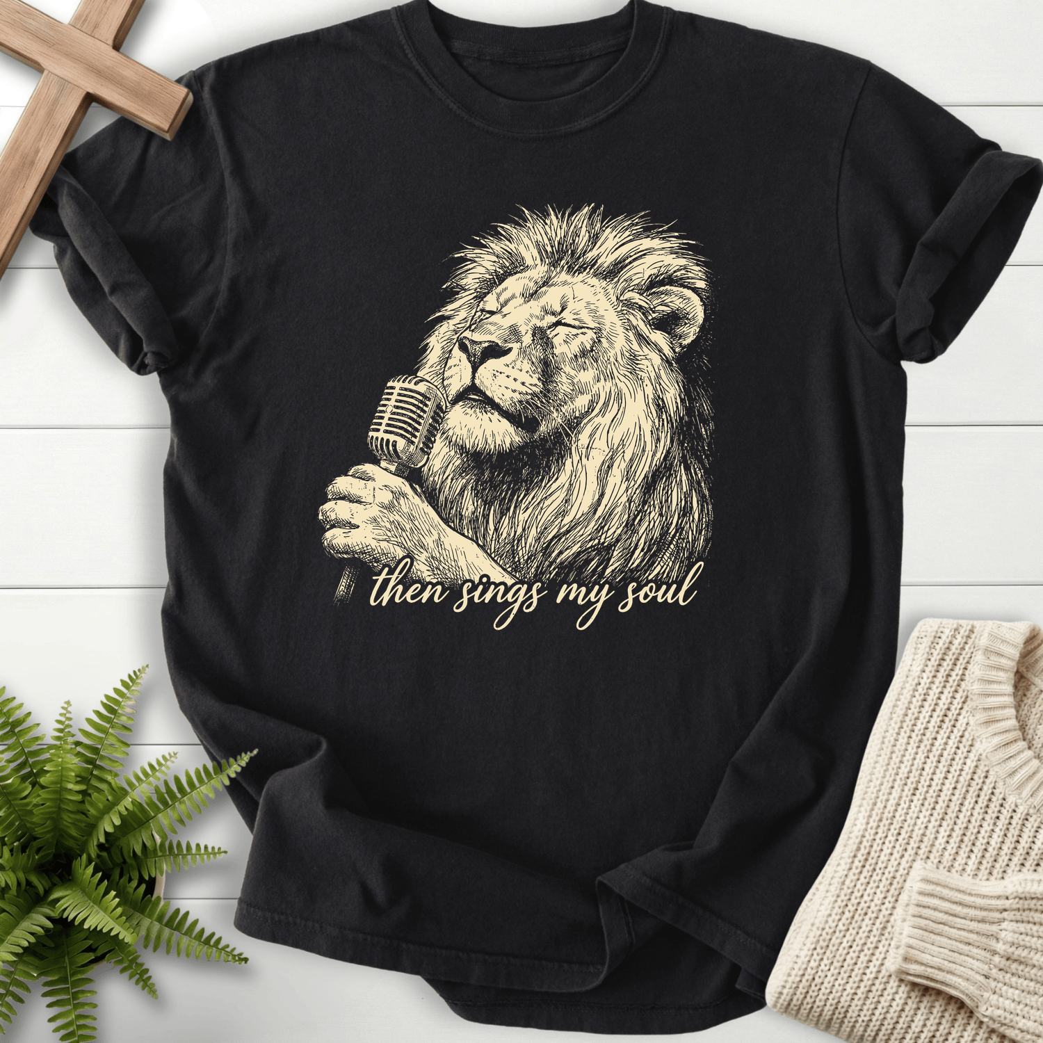 Black Christian t-shirt for women with tonal line-art of a lion and microphone and Then Sings My Soul in cursive.