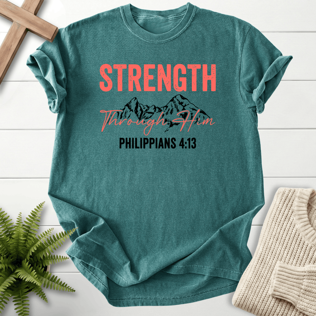 Blue Spruce Christian t-shirt for women with a mountain range sketch and Strength Through Him lettering, inspired by Philippians 4:13.