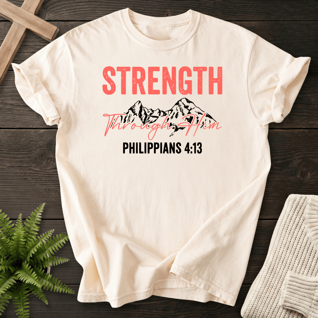 Ivory Christian t-shirt for women with Strength Through Him mountain artwork, by She Wears Faith, inspired by Philippians 4:13.