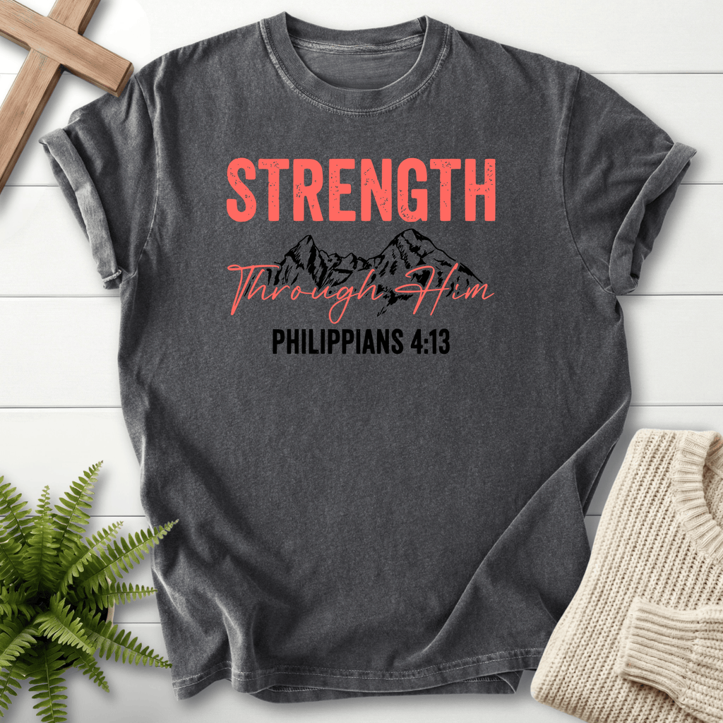 Pepper faith-based tee with bold Strength Through Him text and a mountain graphic, inspired by Philippians 4:13.