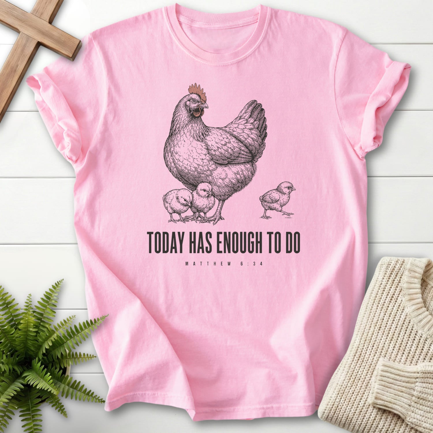 Flatlay of a Blossom Comfort Colors 1717 Scripture shirt with "Today Has Enough To Do T-Shirt" Matthew 6:34.