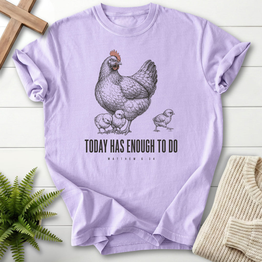 Flat lay of an Orchid women's Christian tee featuring "Today Has Enough To Do T-Shirt" Matthew 6:34.