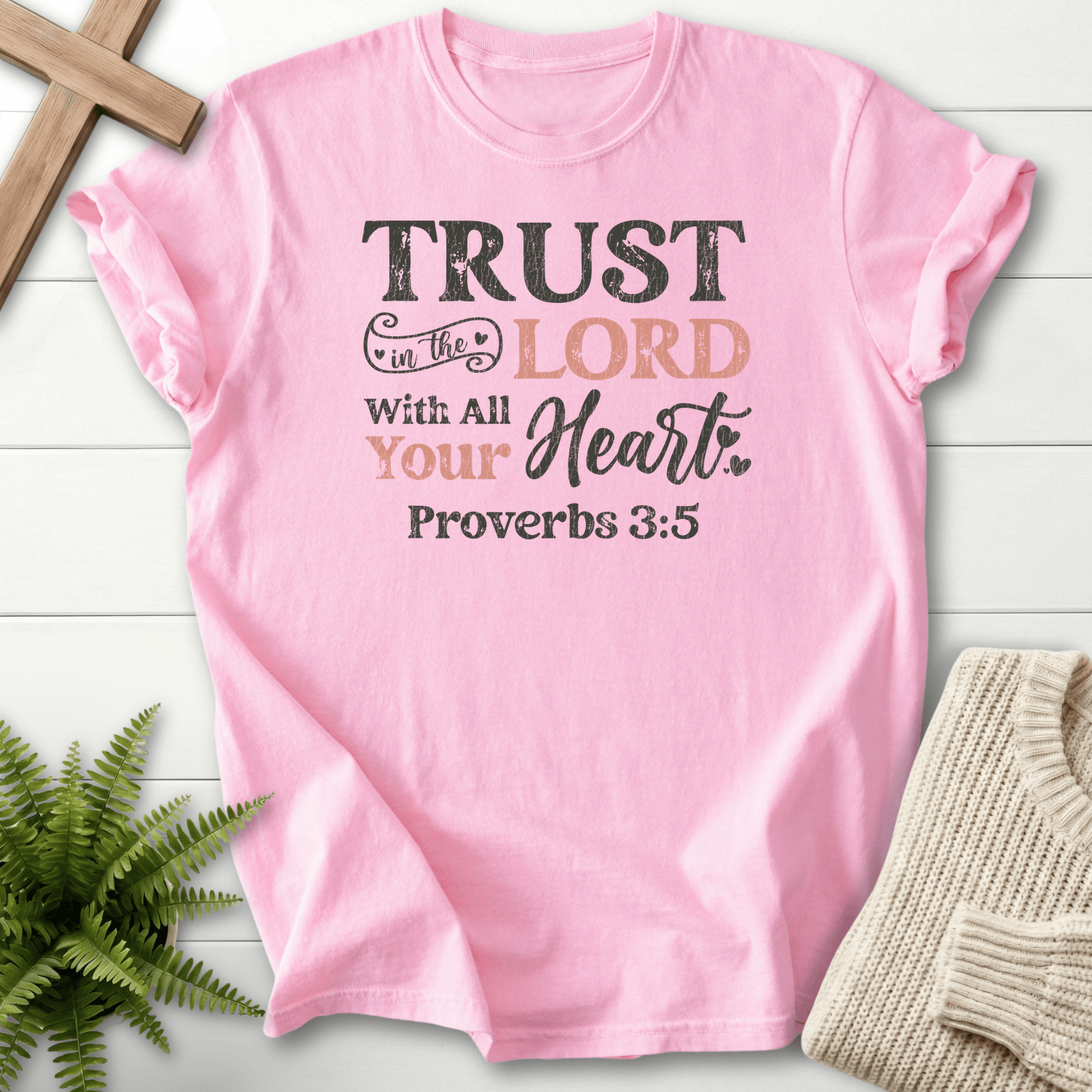 Blossom faith-based tee with distressed black and pink Trust in the Lord lettering and heart motif, by She Wears Faith.