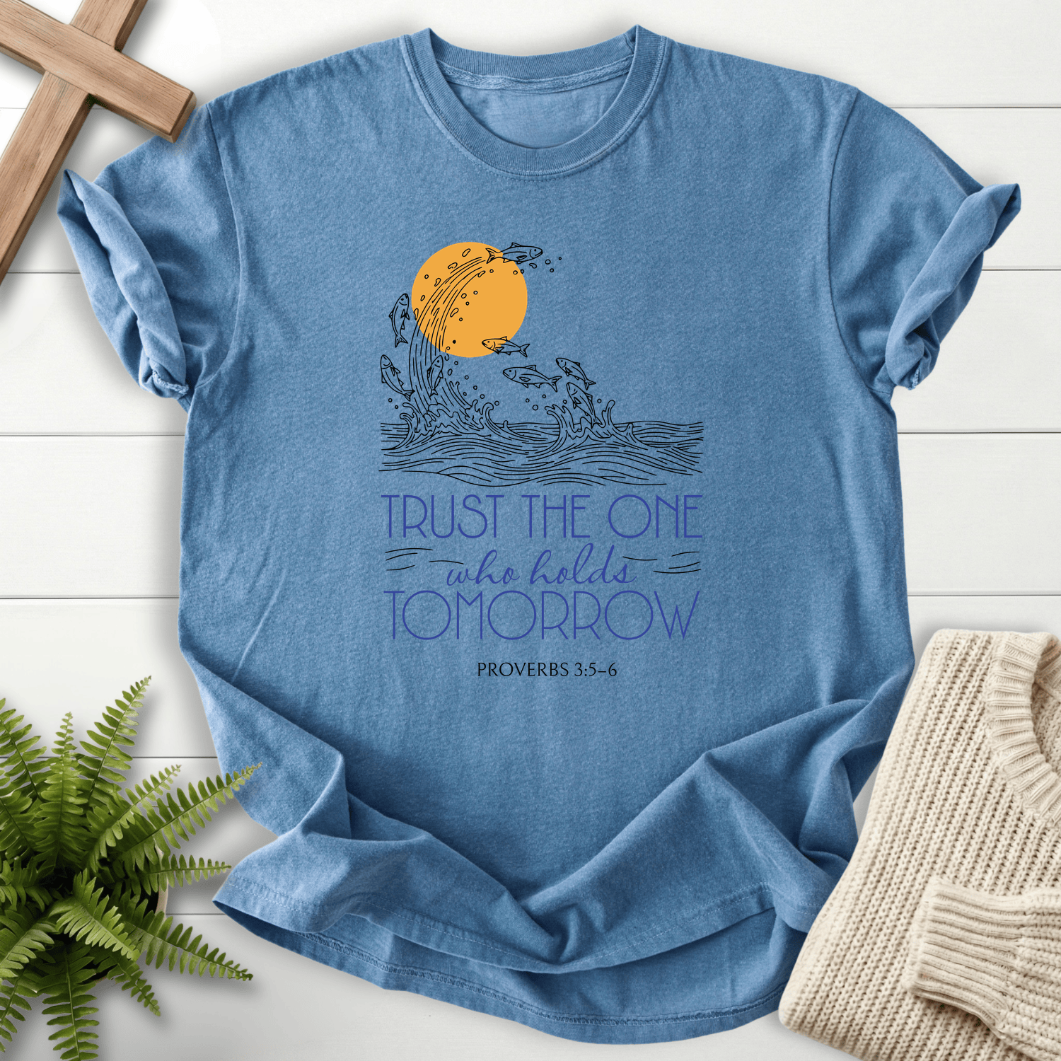 Blue jean Scripture shirt with ocean wave fish graphic and Trust the One who holds Tomorrow text, inspired by Proverbs 3:5-6.