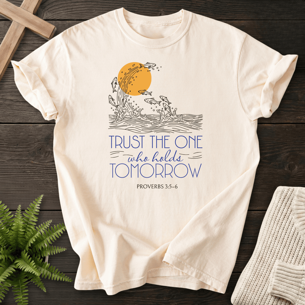 Ivory Christian t-shirt for women with an ocean and sun graphic, inspired by Trust the One who holds Tomorrow and Proverbs 3:5-6.