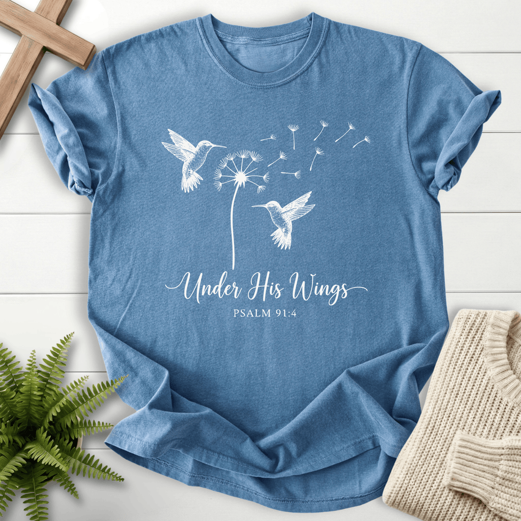 Blue Jean Christian t-shirt for women with hummingbirds and dandelion line art and Under His Wings text, inspired by Psalm 91:4.