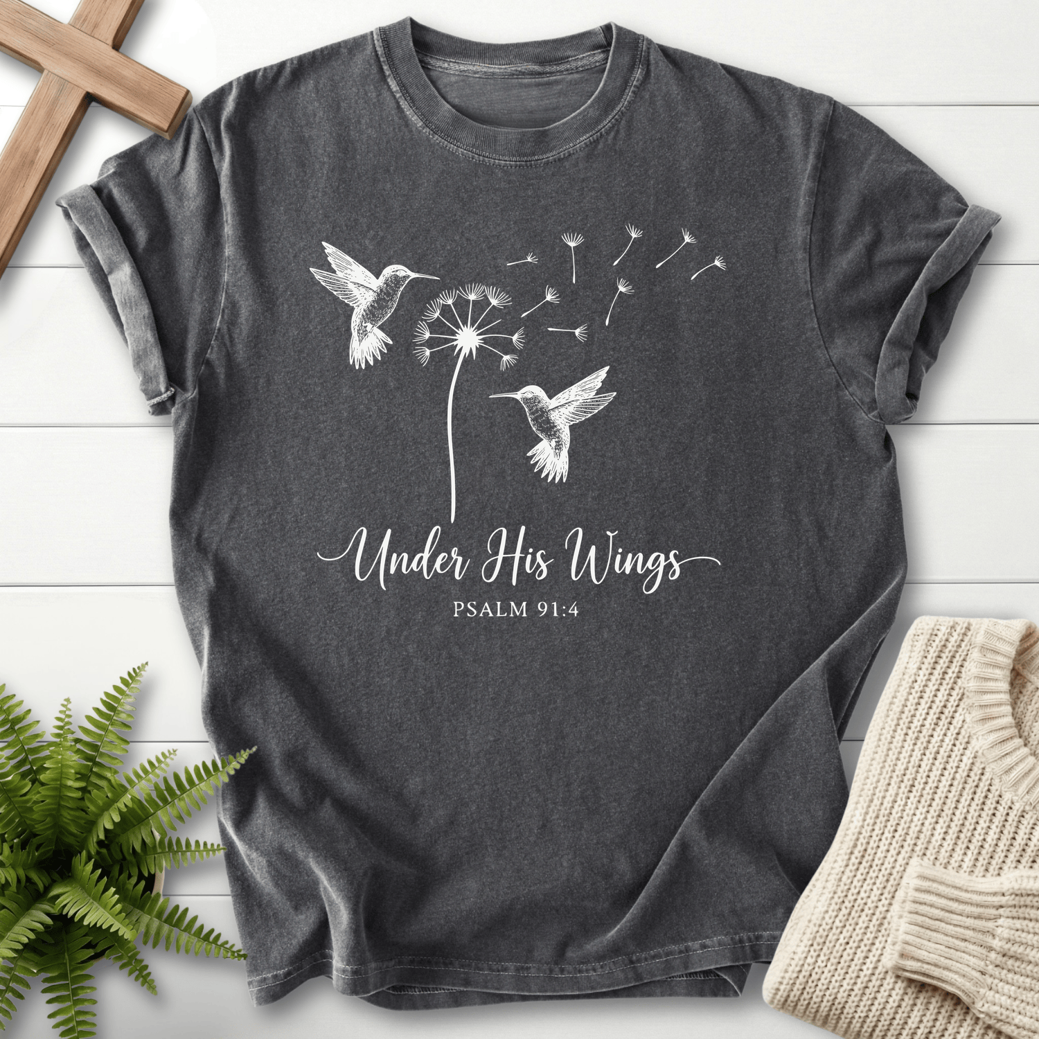 Pepper Bible verse tee with line art hummingbirds and a seed-blown dandelion, Comfort Colors 1717, inspired by Psalm 91:4.