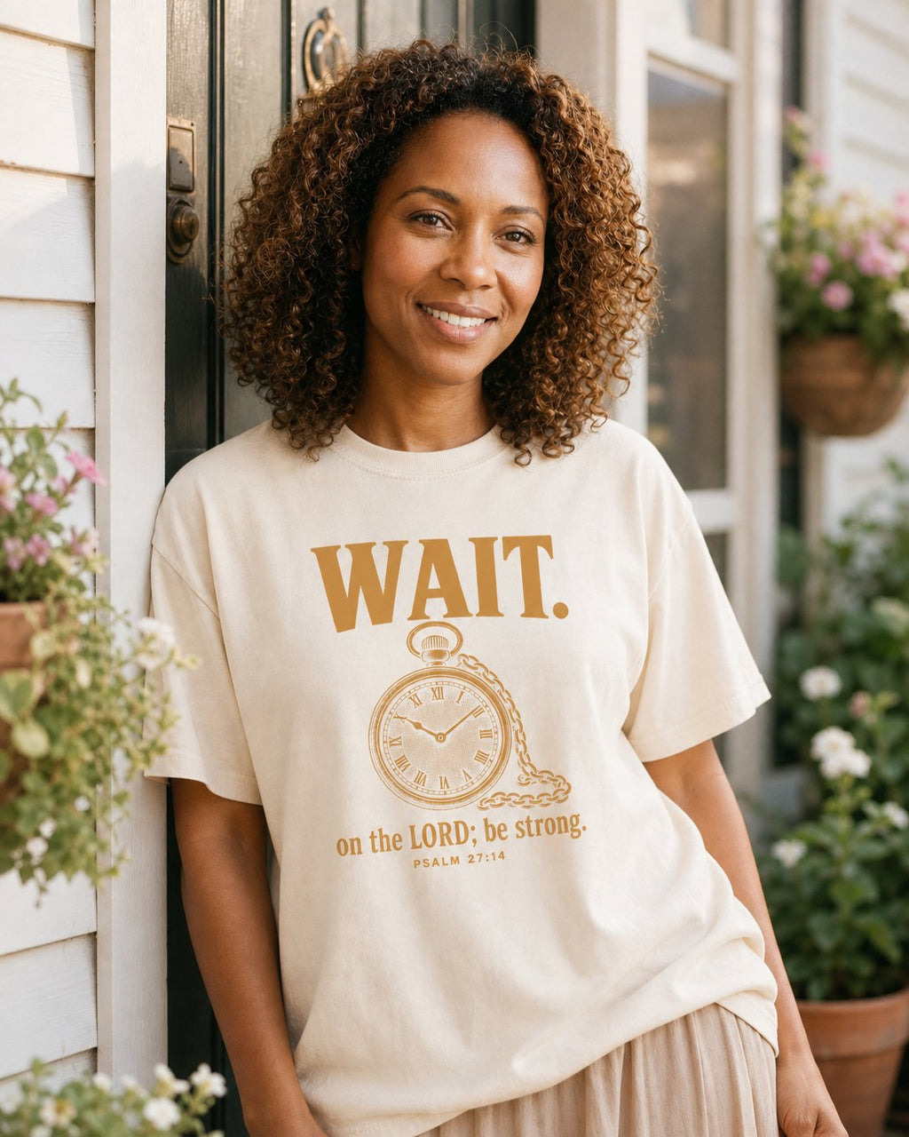 Wait on the Lord Psalm 27 – Ivory women's Christian tee, lifestyle photo in cottage doorway – Antique pocket watch with bold WAIT lettering – Psalm 27:14 – She Wears Faith