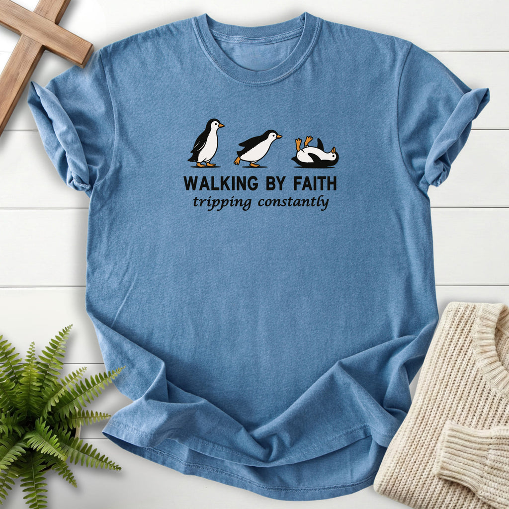 Flat lay of a Blue Jean Christian t-shirt for women featuring "Walking BY Faith T-Shirt" design.