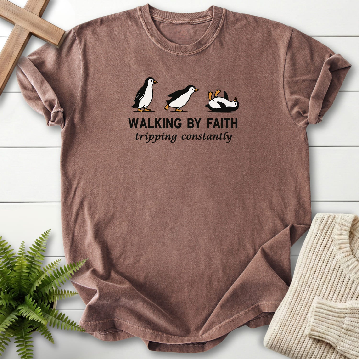 Flatlay of an Espresso faith-based tee with "Walking BY Faith T-Shirt" design For faith wear collections.