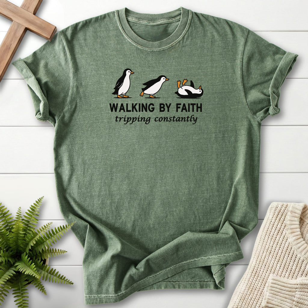 Flatlay of a Moss Christian graphic tee with "Walking BY Faith T-Shirt" design From Printify.