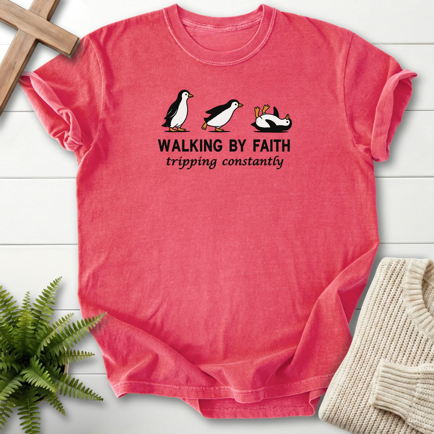 Flat lay of a Watermelon faith-inspired shirt featuring "Walking BY Faith T-Shirt" design.