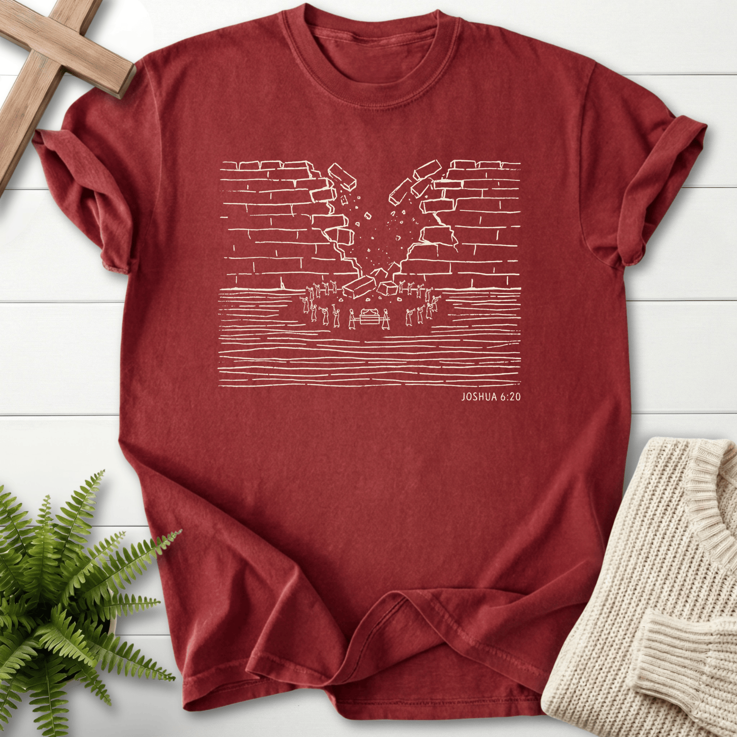Brick Christian t-shirt for women with gold Walls of Jericho crumbling illustration, inspired by Joshua 6:20.