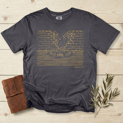 Comfort Colors 1717 pepper grey Christian women tee featuring a minimalist line-art depiction of the walls of Jericho collapsing, inspired by Joshua 6:20. Simple faith-based artwork on a vintage garment-dyed T-shirt, perfect for US faith wear and scripture apparel.