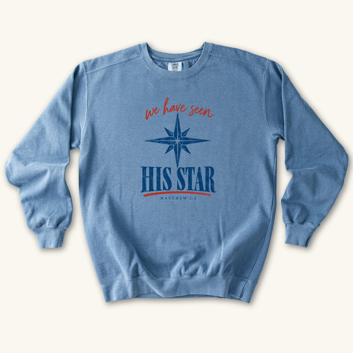 Blue Jean Christian Christmas sweatshirt with We Have Seen His Star lettering, an eight-pointed star and Matthew 2:2.