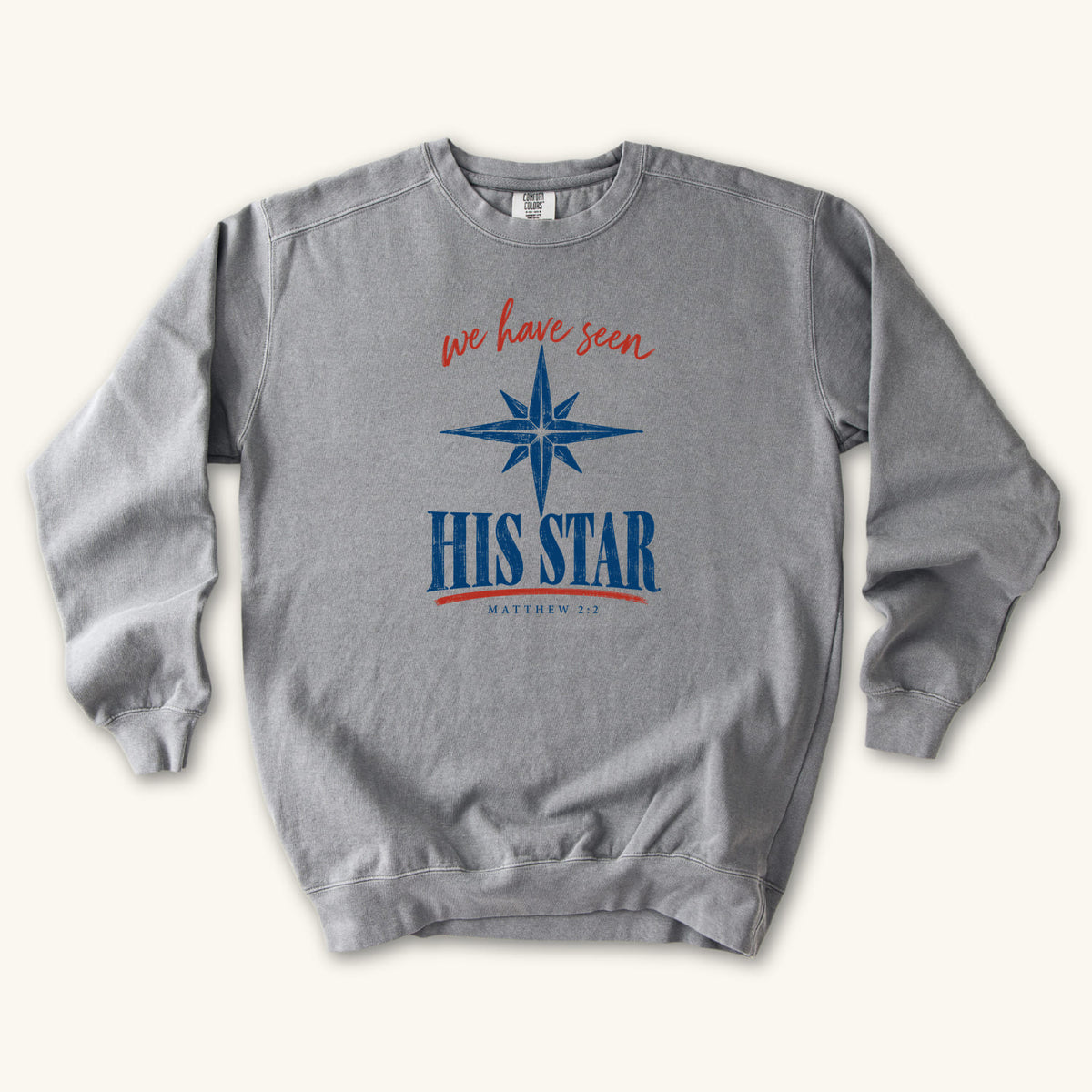 Grey Christian Christmas sweatshirt with We Have Seen His Star lettering, an eight-pointed star and Matthew 2:2.
