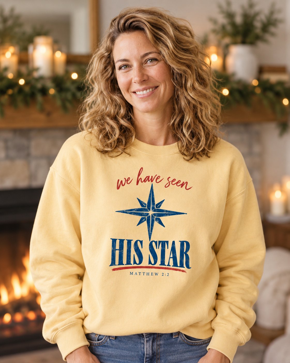 We Have Seen His Star, Butter women's Christian sweatshirt, lifestyle photo in cozy holiday setting, Blue compass star above we have seen HIS STAR, She Wears Faith