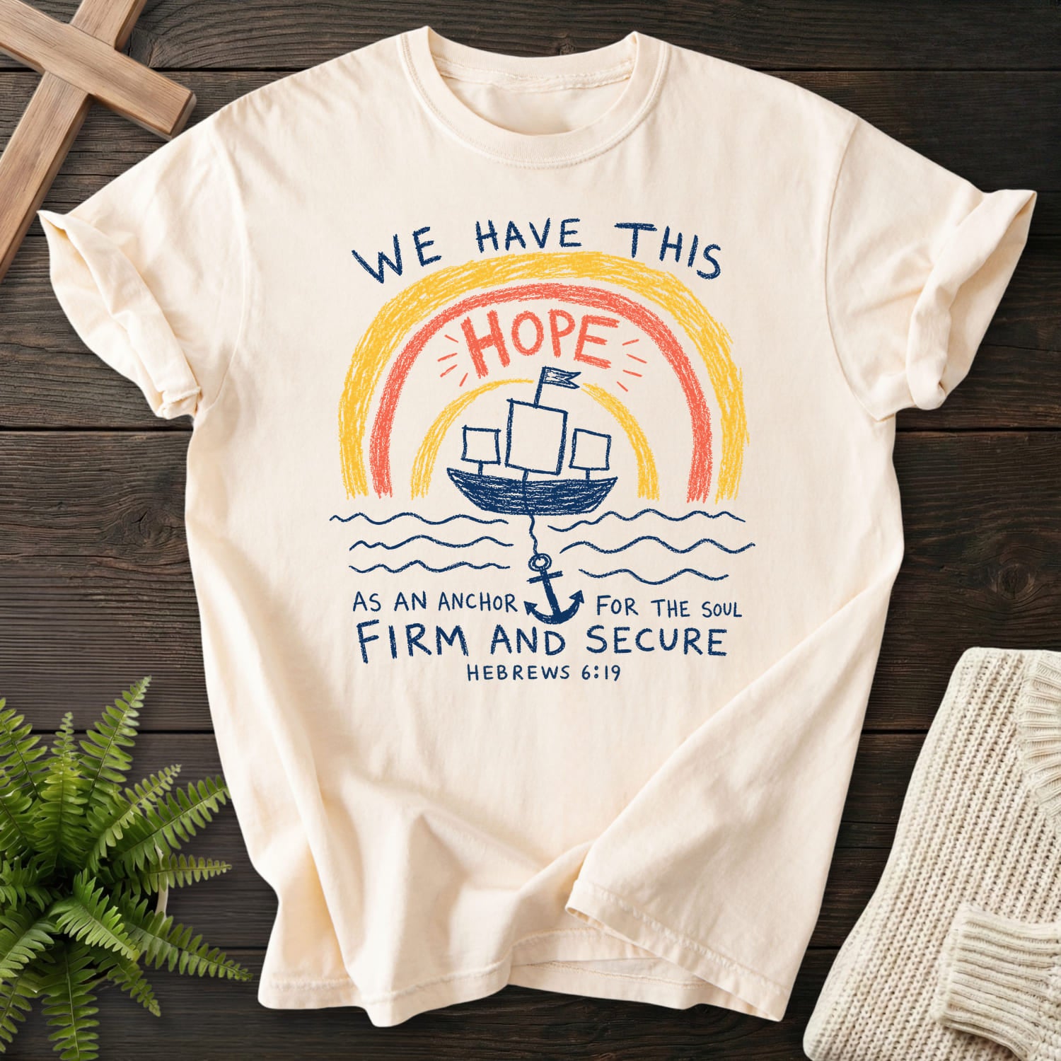 Ivory color option for the We Have This Hope faith-based tee with "WE HAYE THIS T-Shirt" Hebrews 6:19.
