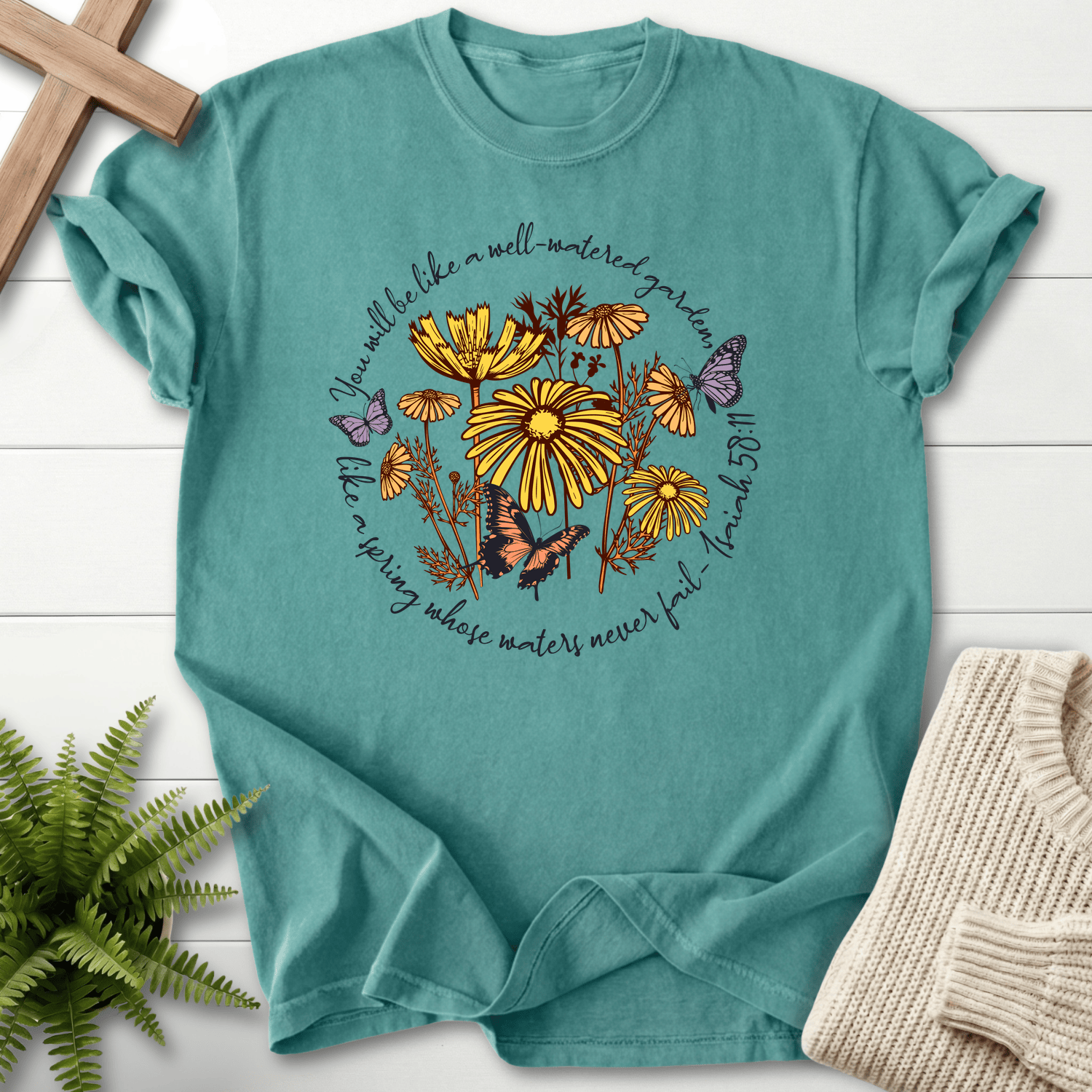 Chalky Mint faith-based tee with a Well-Watered Garden floral wreath, inspired by Isaiah 58:11.