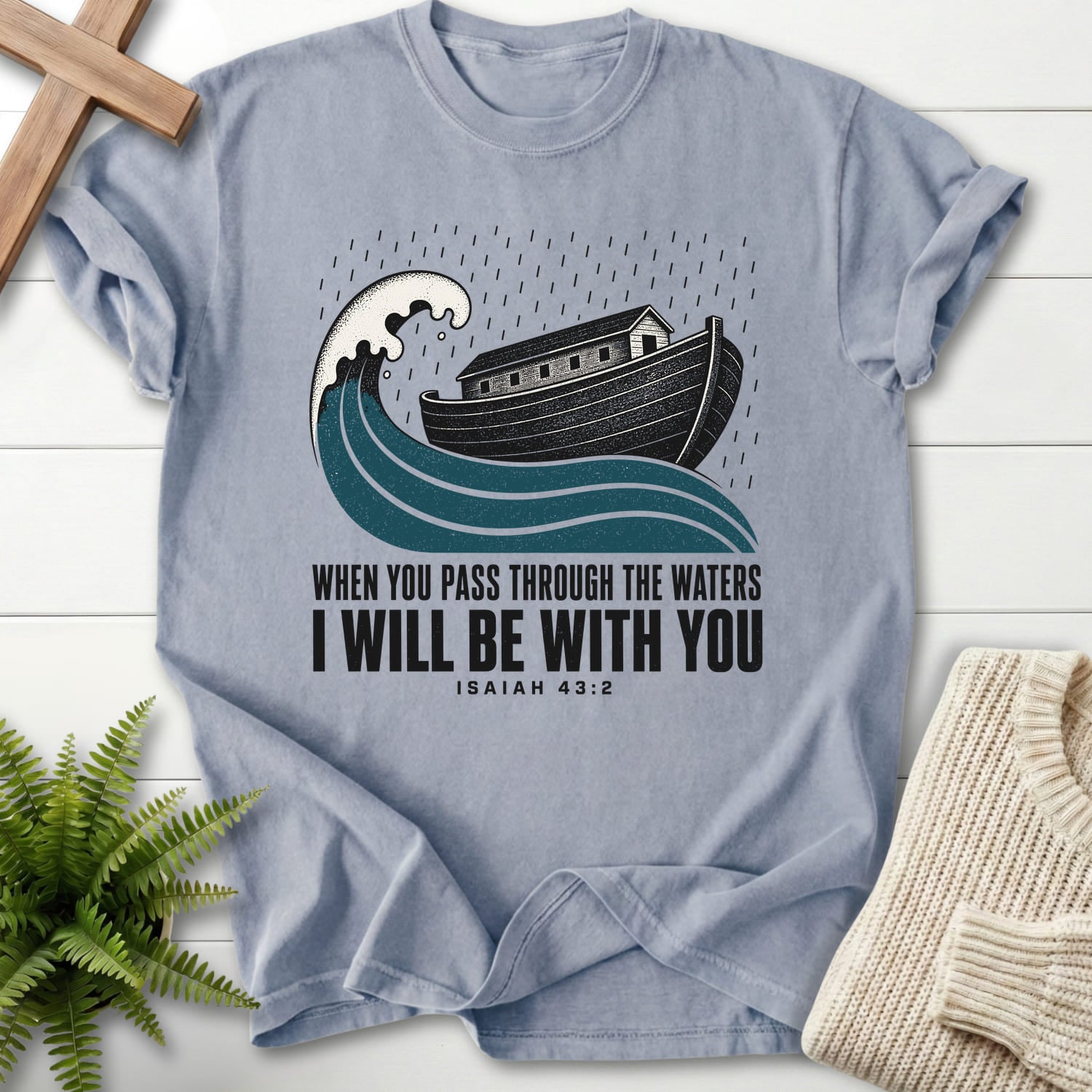 Flat lay of a Granite faith-inspired shirt featuring "When You Pass Through The Waters T-Shirt" Isaiah 43:2.