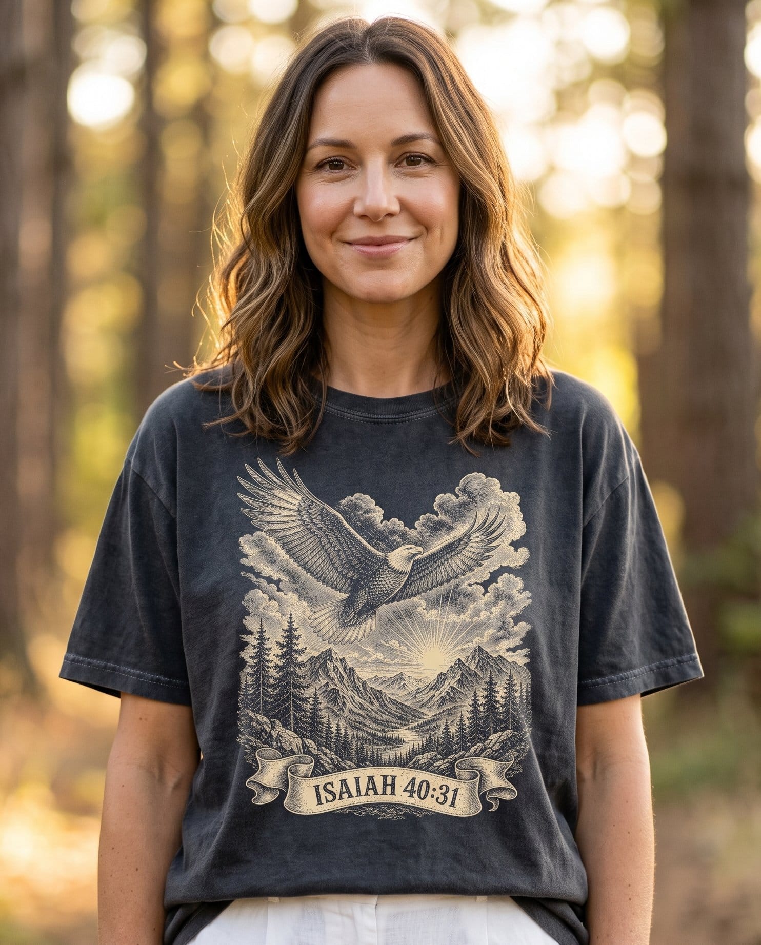 Wings Like Eagles – Pepper women's Christian tee, lifestyle photo in nature trail – Engraved-style bald eagle soaring over mountains and a sunrise – Isaiah 40:31 – She Wears Faith