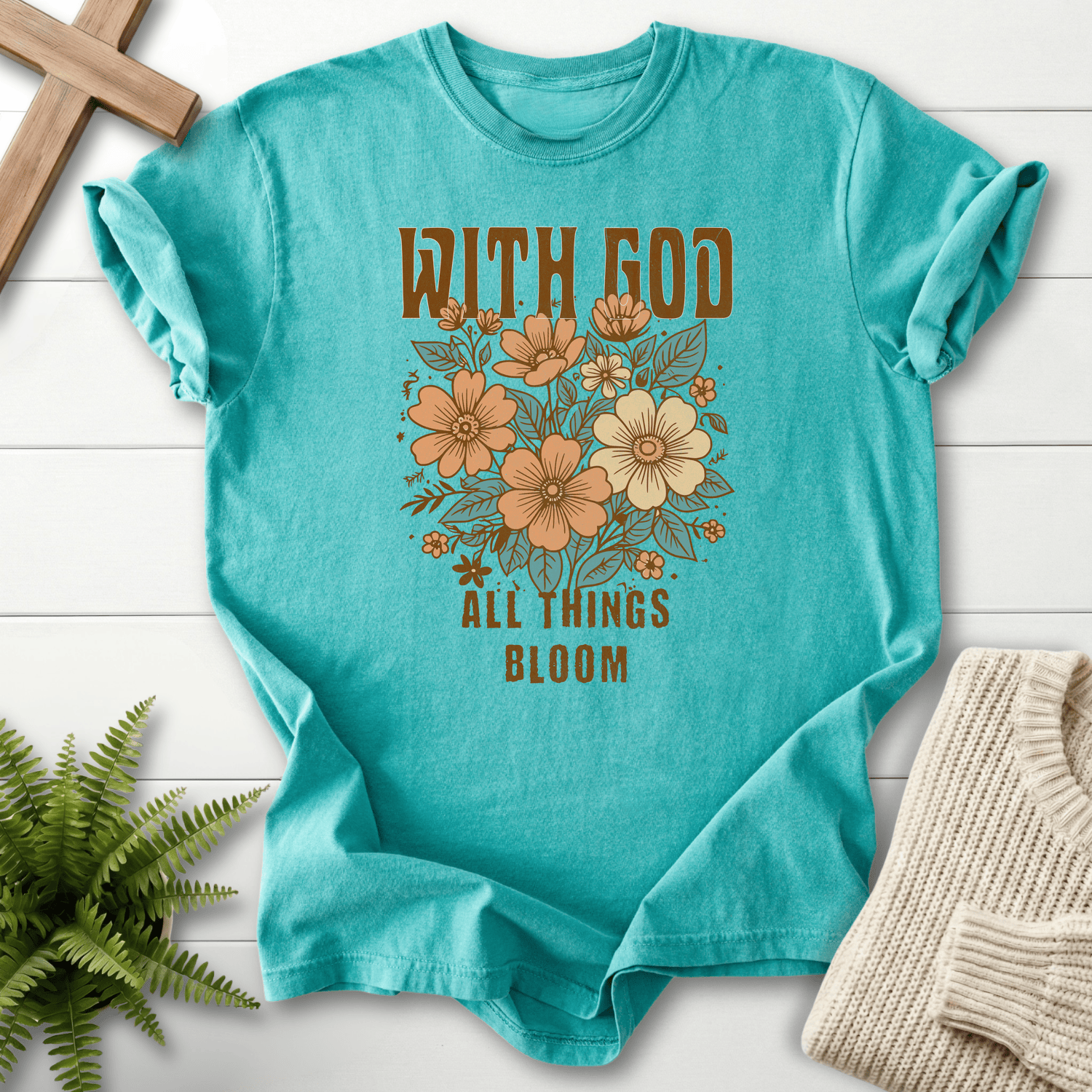 Seafoam Christian t-shirt for women with a retro floral bouquet and With God All Things Bloom lettering.