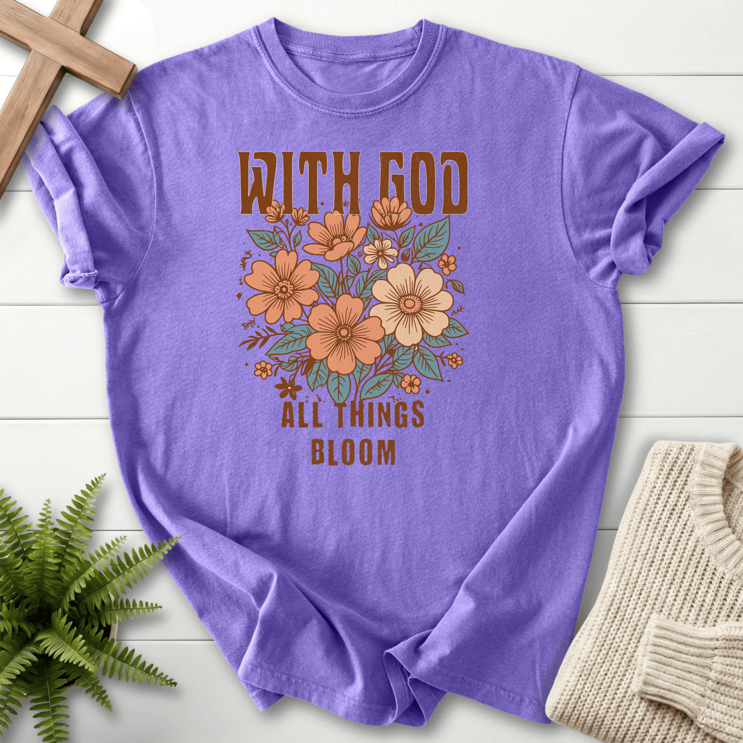 Violet Christian t-shirt for women with an earthy floral bouquet and bold bloom lettering.