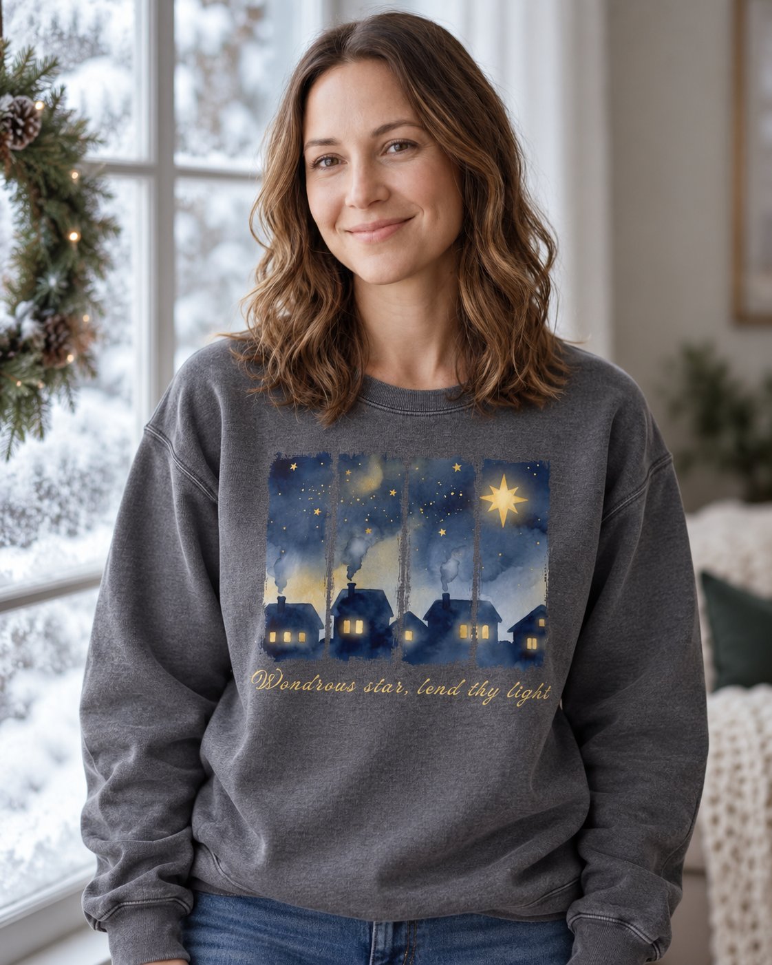 Wondrous Star, Pepper women's Christian sweatshirt, lifestyle photo in cozy holiday setting, Painted village night sky with Wondrous star lend thy light, She Wears Faith