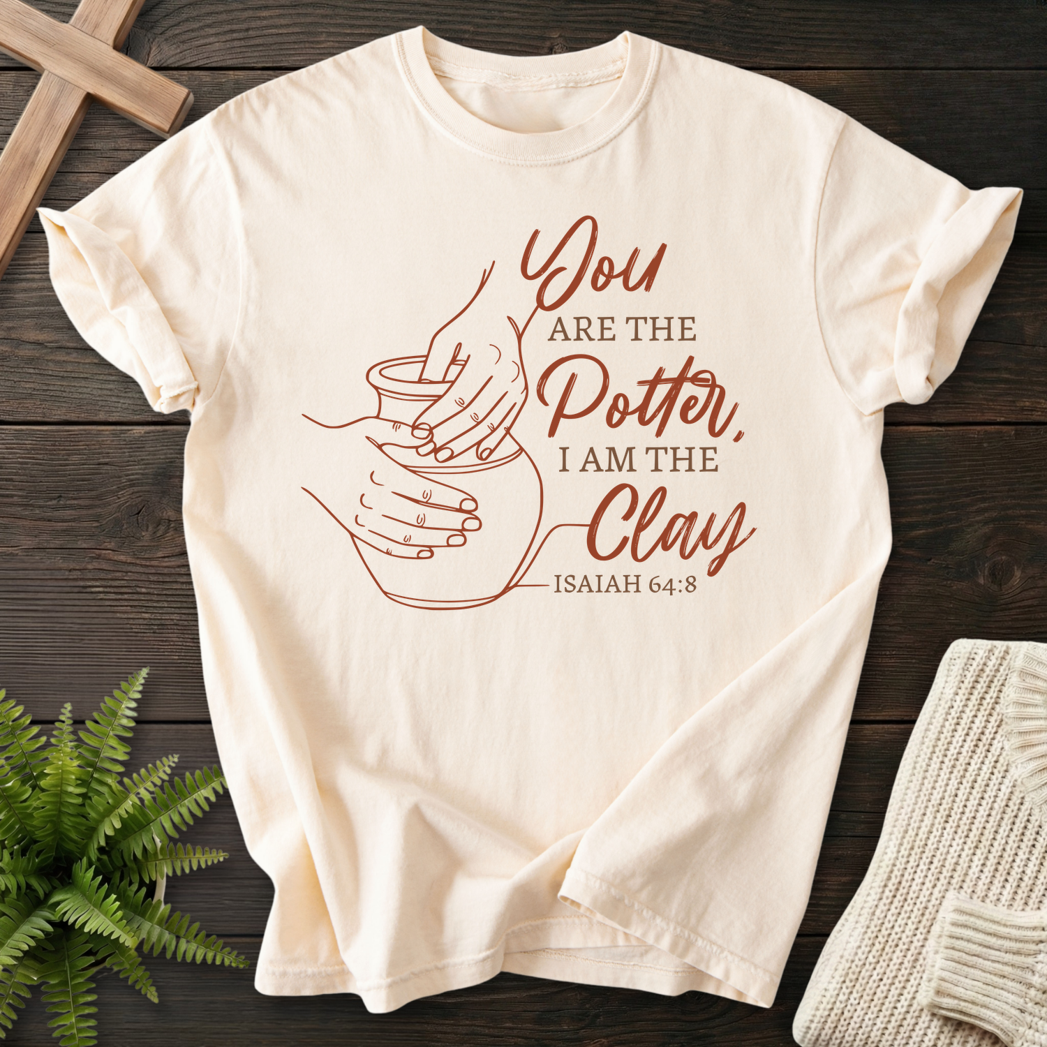 Ivory Christian t-shirt for women with potter's wheel hand line art and You Are the Potter text, inspired by Isaiah 64:8.